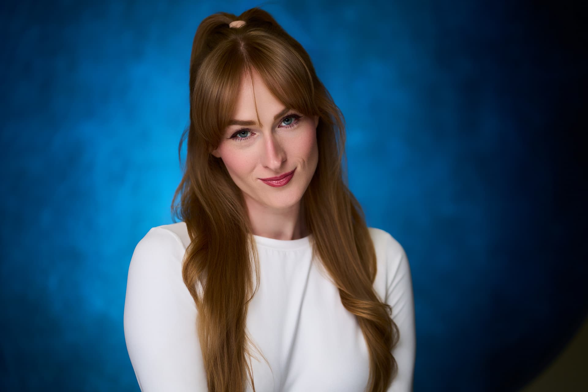 Ariana Sloan dramatic headshot with moody lighting - actress range