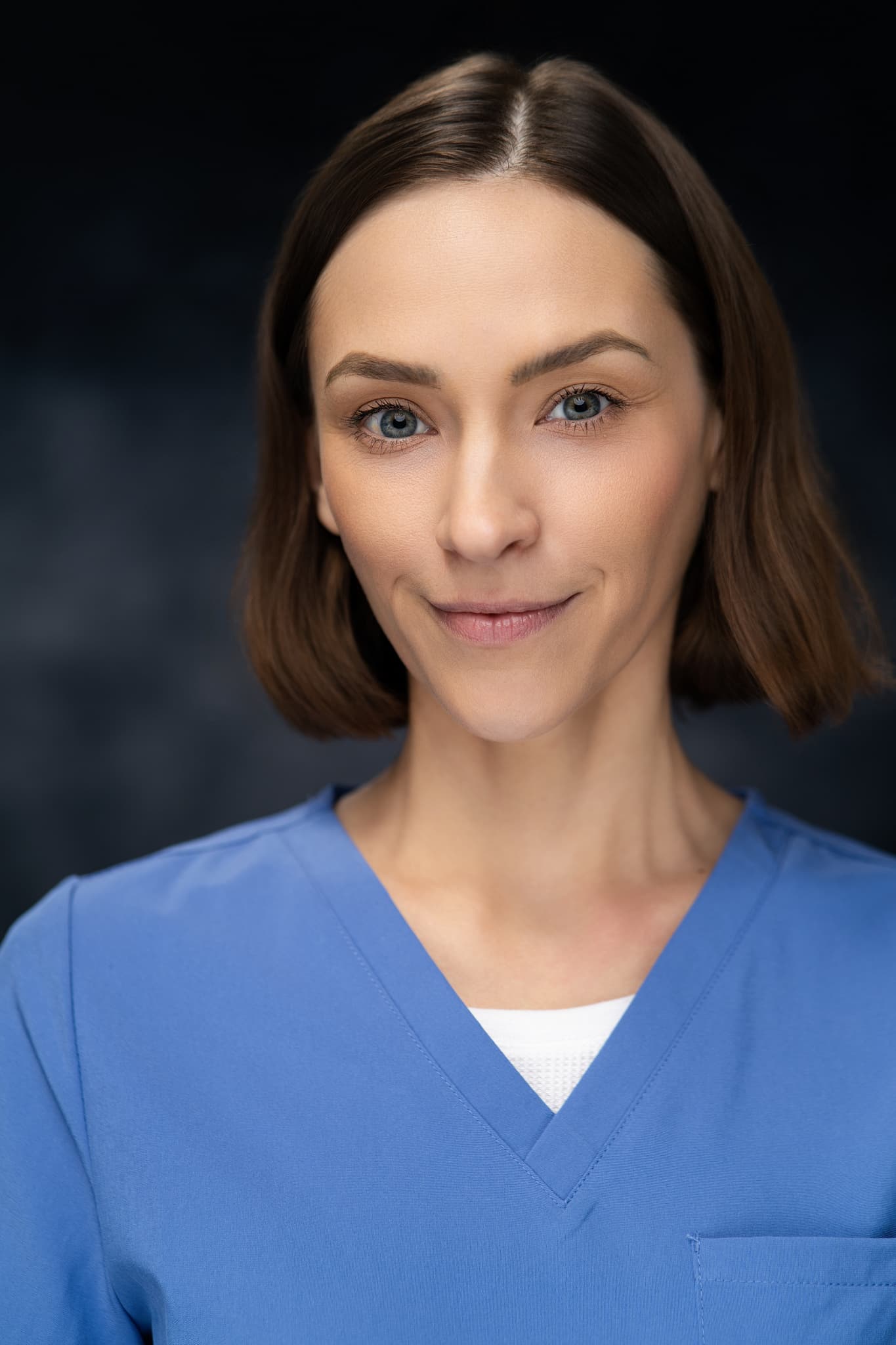 Kaitlin Doughty dramatic headshot with shadow play - actress range