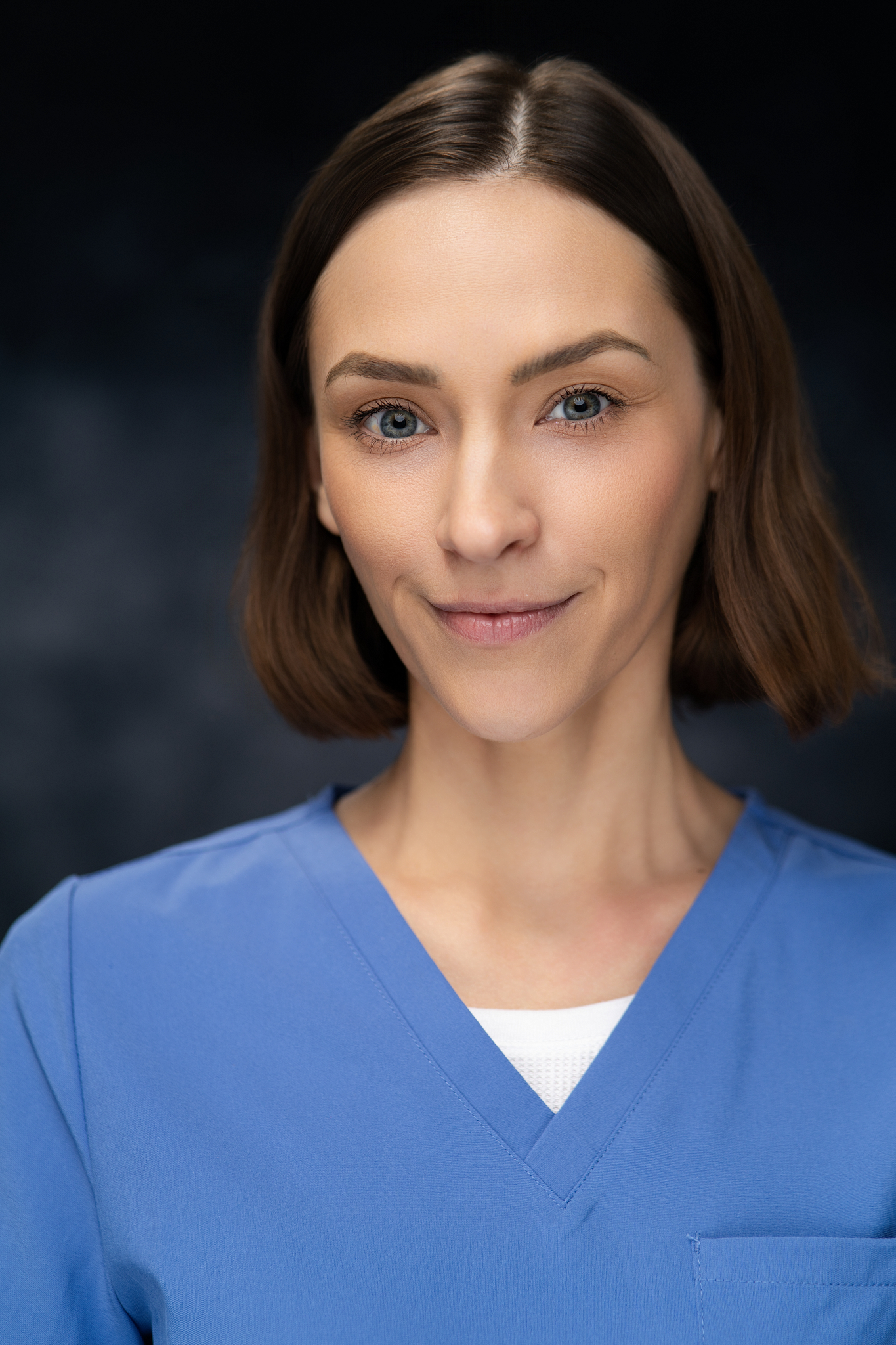 Kaitlin Doughty dramatic headshot with shadow play - actress range